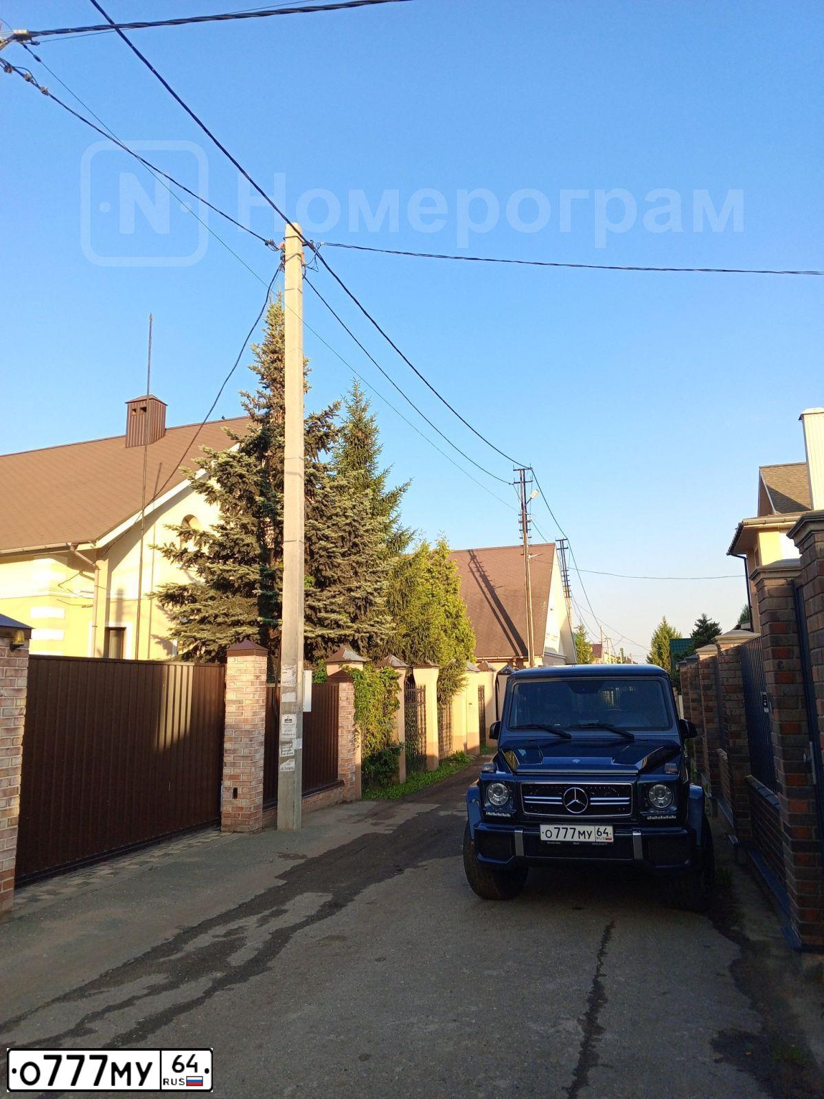 Фото автомобиля HUMMER H2, 2007 — госномер О008ОС64. Цвет: Серебристый