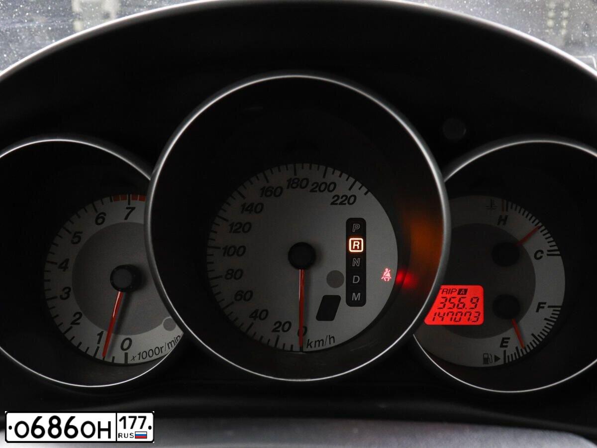 Фото автомобиля MAZDA 3, 2006 — госномер В973КО977. Цвет: Серебристый