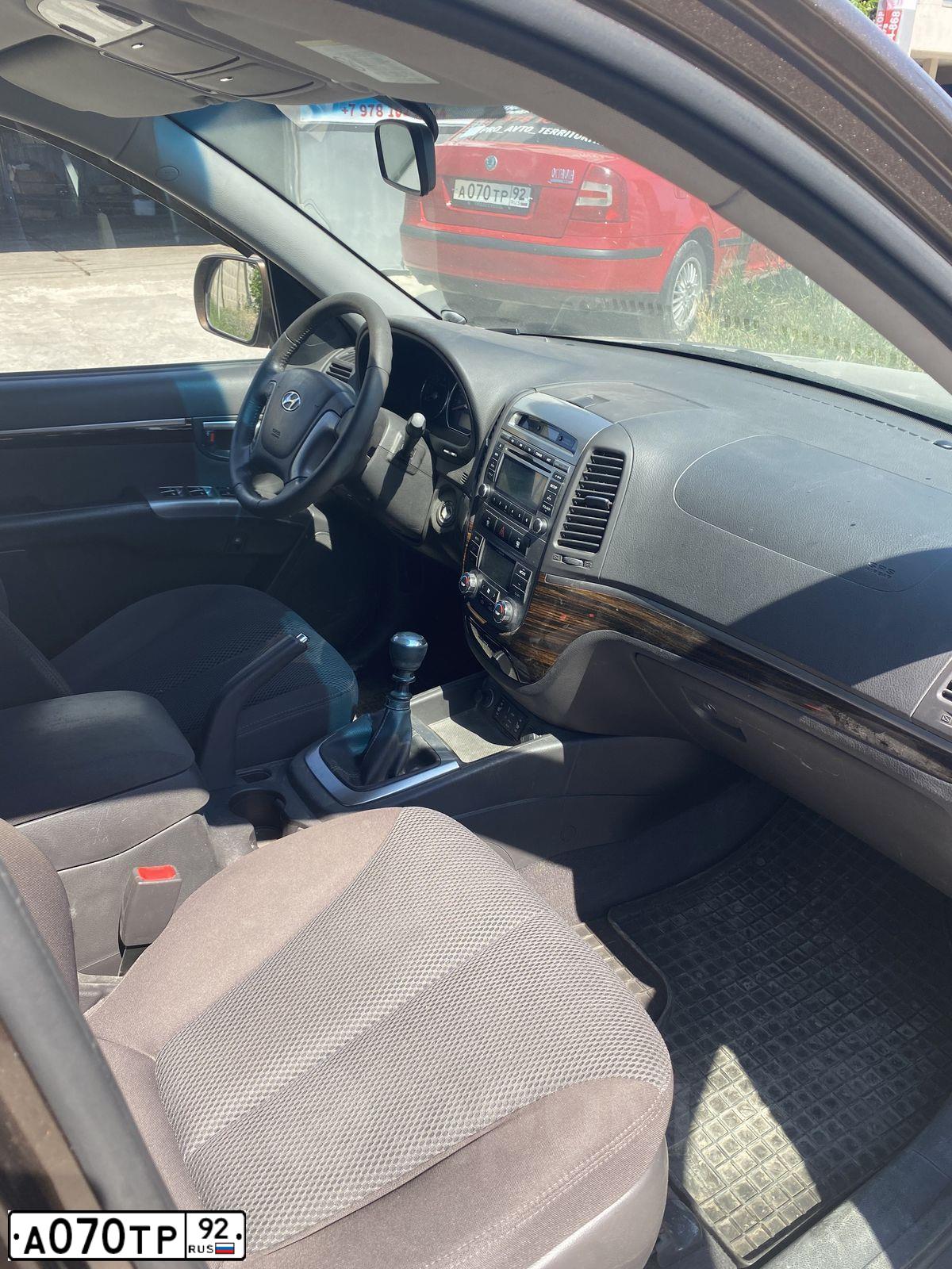 Фото автомобиля SKODA OCTAVIA, 2005 — госномер М314РЕ82. Цвет: Красный