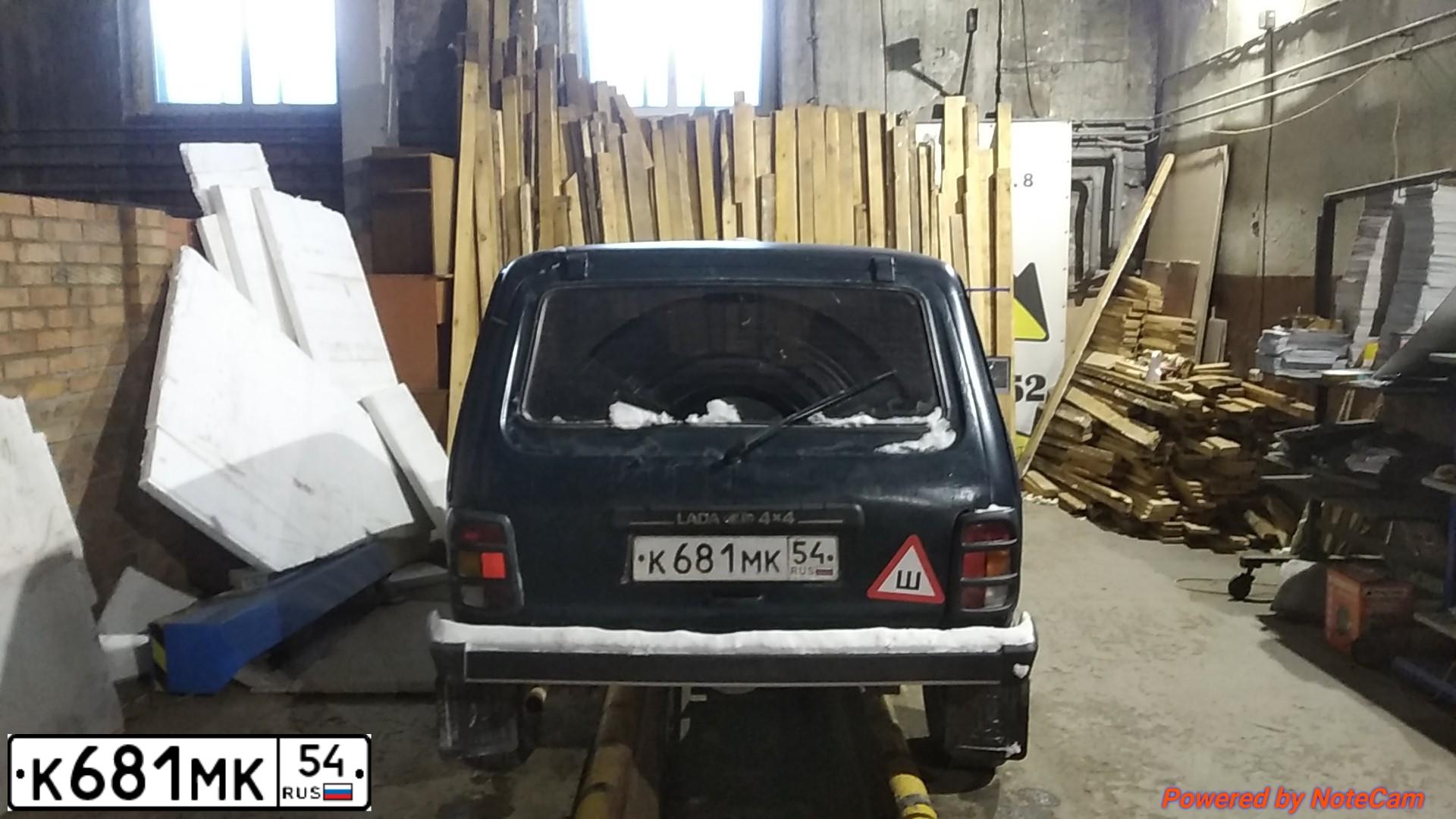 Фото автомобиля LADA NIVA, 1999 — госномер М947СН154. Цвет: СИНЕ ЗЕЛЕНЫЙ