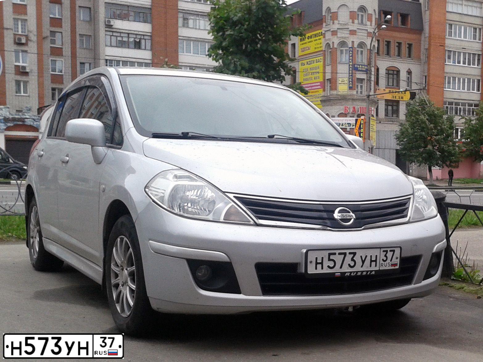 Фото автомобиля NISSAN TIIDA, 2012 — госномер В371КР37. Цвет: Серебристый