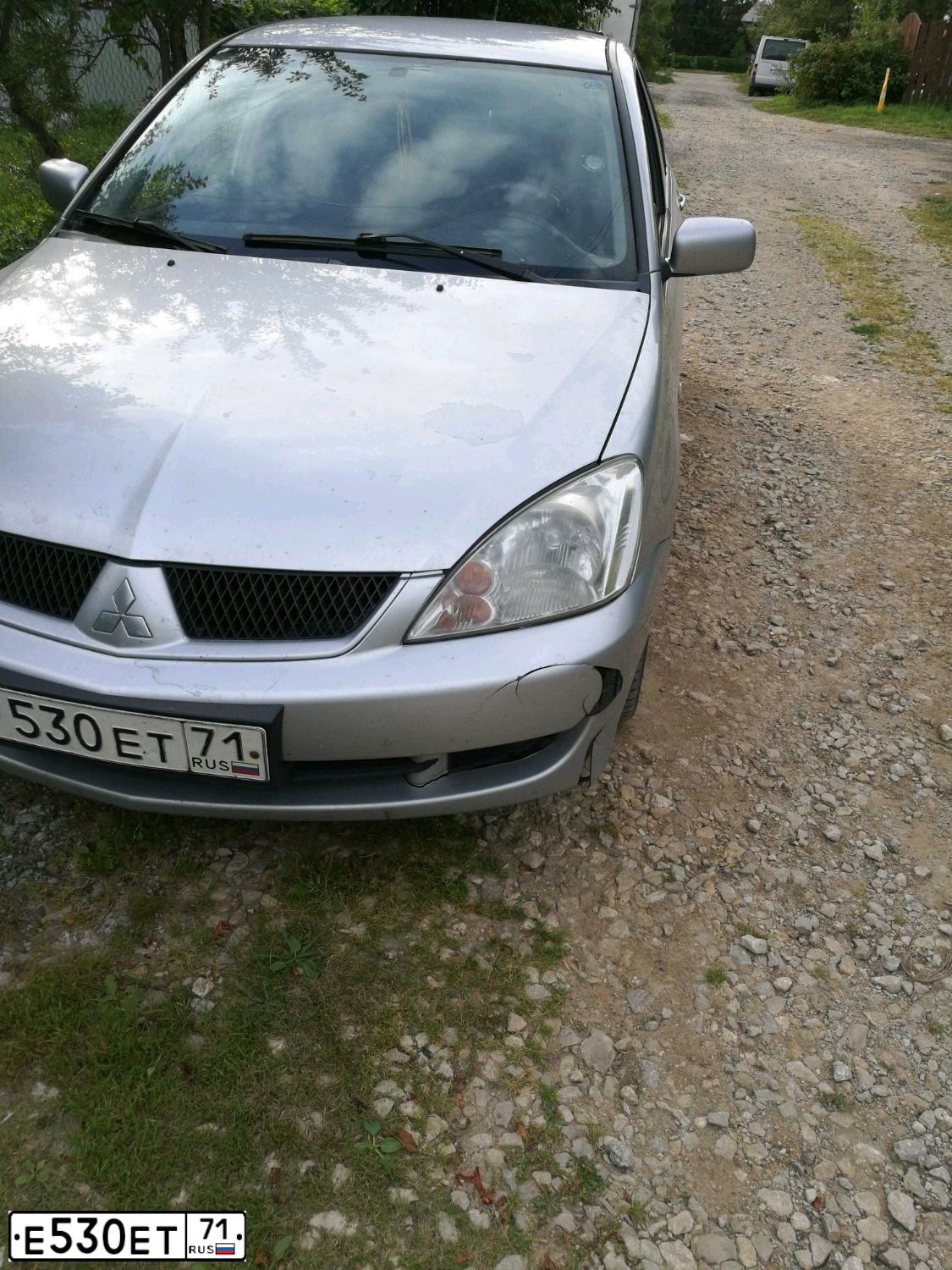 Фото автомобиля MITSUBISHI LANCER, 2006 — госномер О609КМ71. Цвет: Серебристый