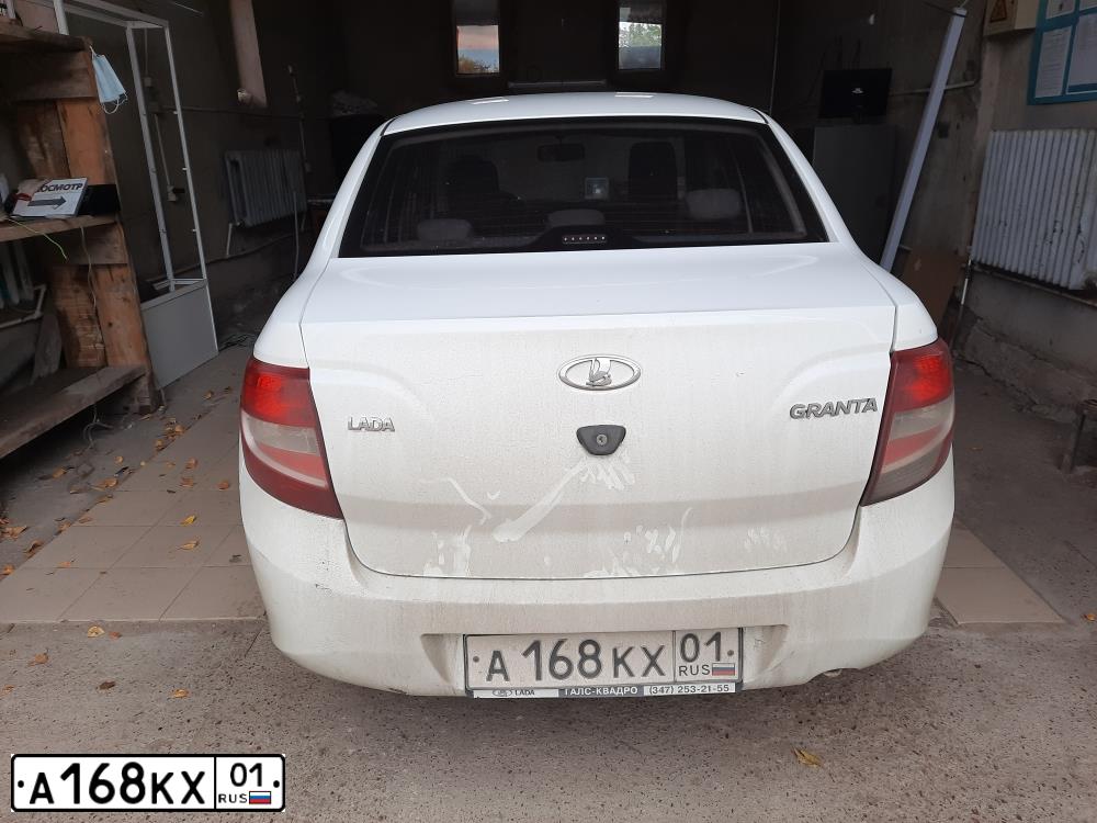 Фото автомобиля LADA 2190 GRANTA, 2014 — госномер А168КХ01. Цвет: Белый
