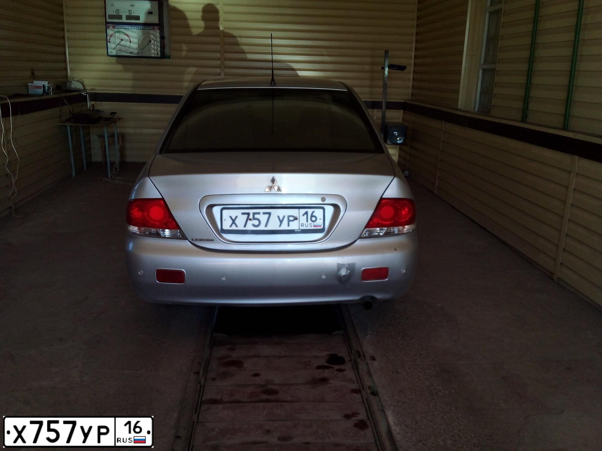 Фото автомобиля MITSUBISHI LANCER, 2005 — госномер Х757УР16. Цвет: СЕРЕБРИСТЫЙ