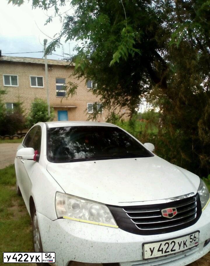 Фото автомобиля GEELY EMGRAND, 2014 — госномер У422УК56. Цвет: Белый
