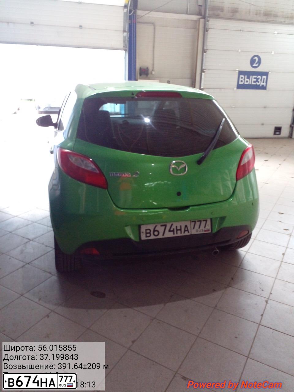 Фото автомобиля MAZDA 2, 2009 — госномер Т305КВ190. Цвет: ЗЕЛЕНЫЙ