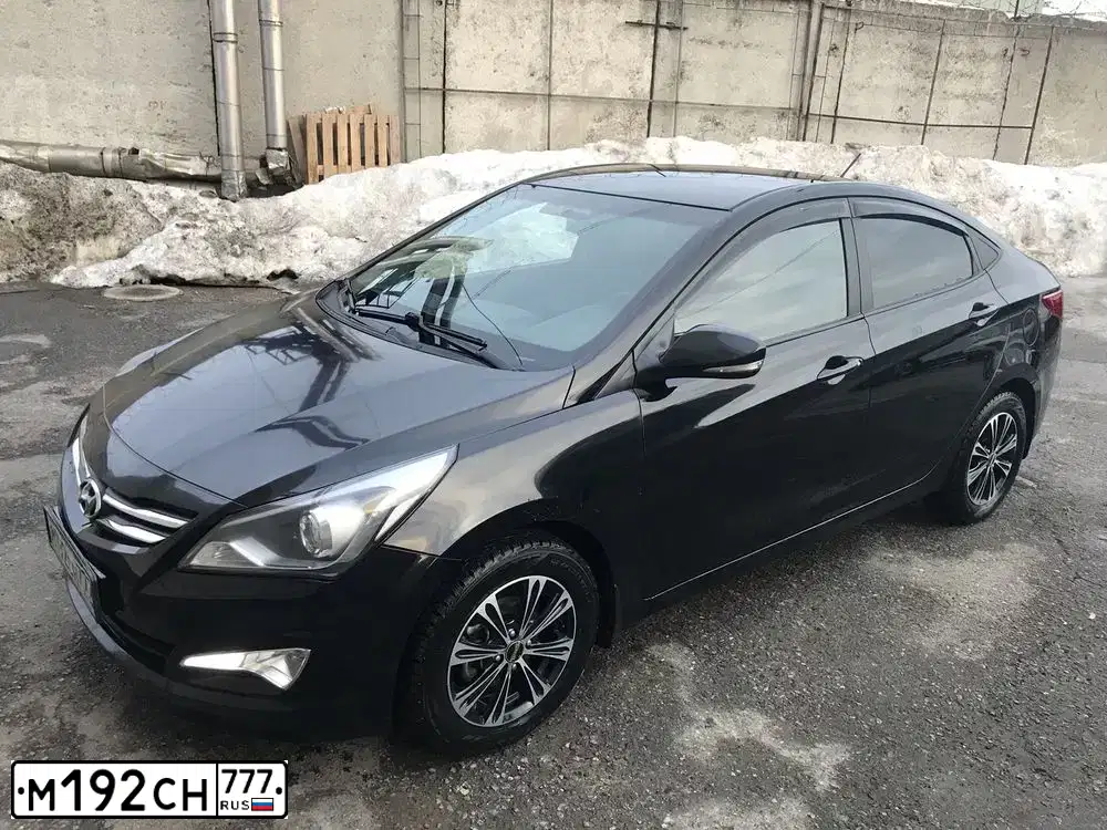 Фото автомобиля HYUNDAI SOLARIS, 2016 — госномер М192СН777. Цвет: ЧЕРНЫЙ
