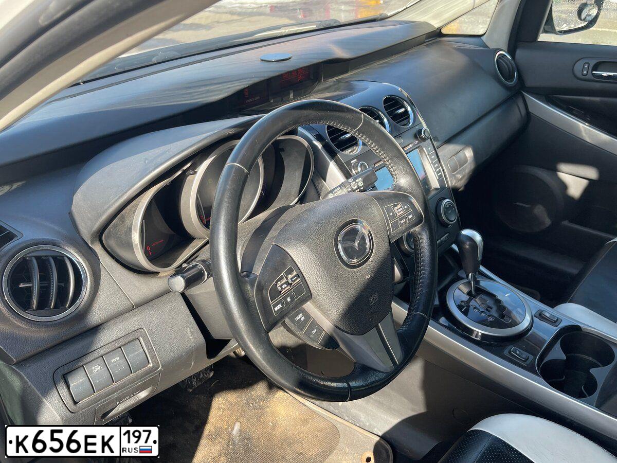 Фото автомобиля MAZDA CX-7, 2010 — госномер Х229СВ790. Цвет: Белый