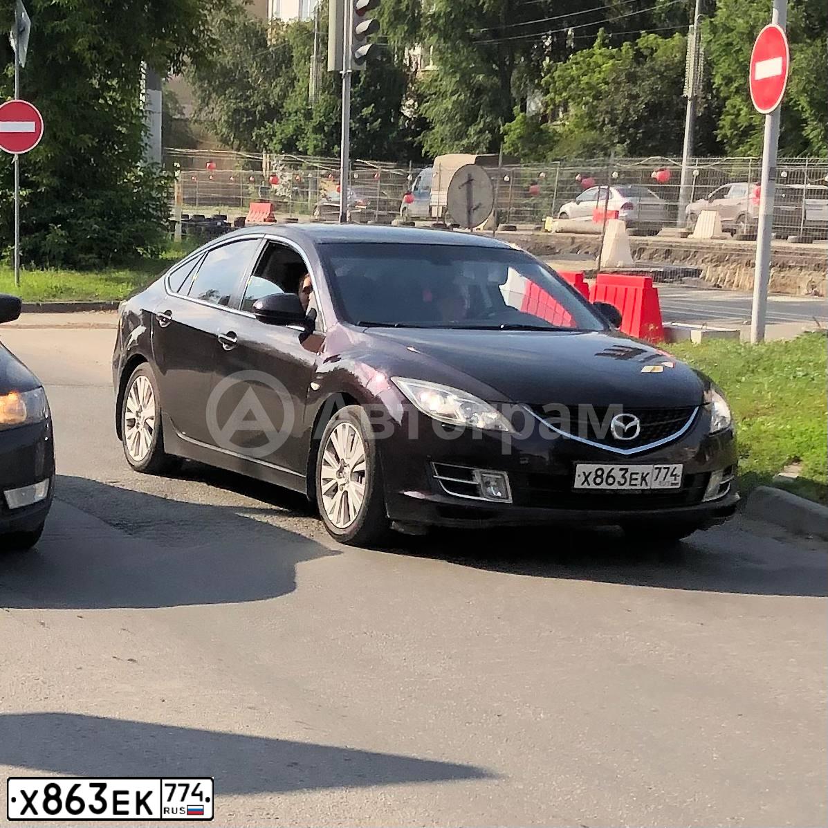 Фото автомобиля MAZDA 6, 2007 — госномер Х863ЕК774. Цвет: ТЕМНО-БОРДОВЫЙ