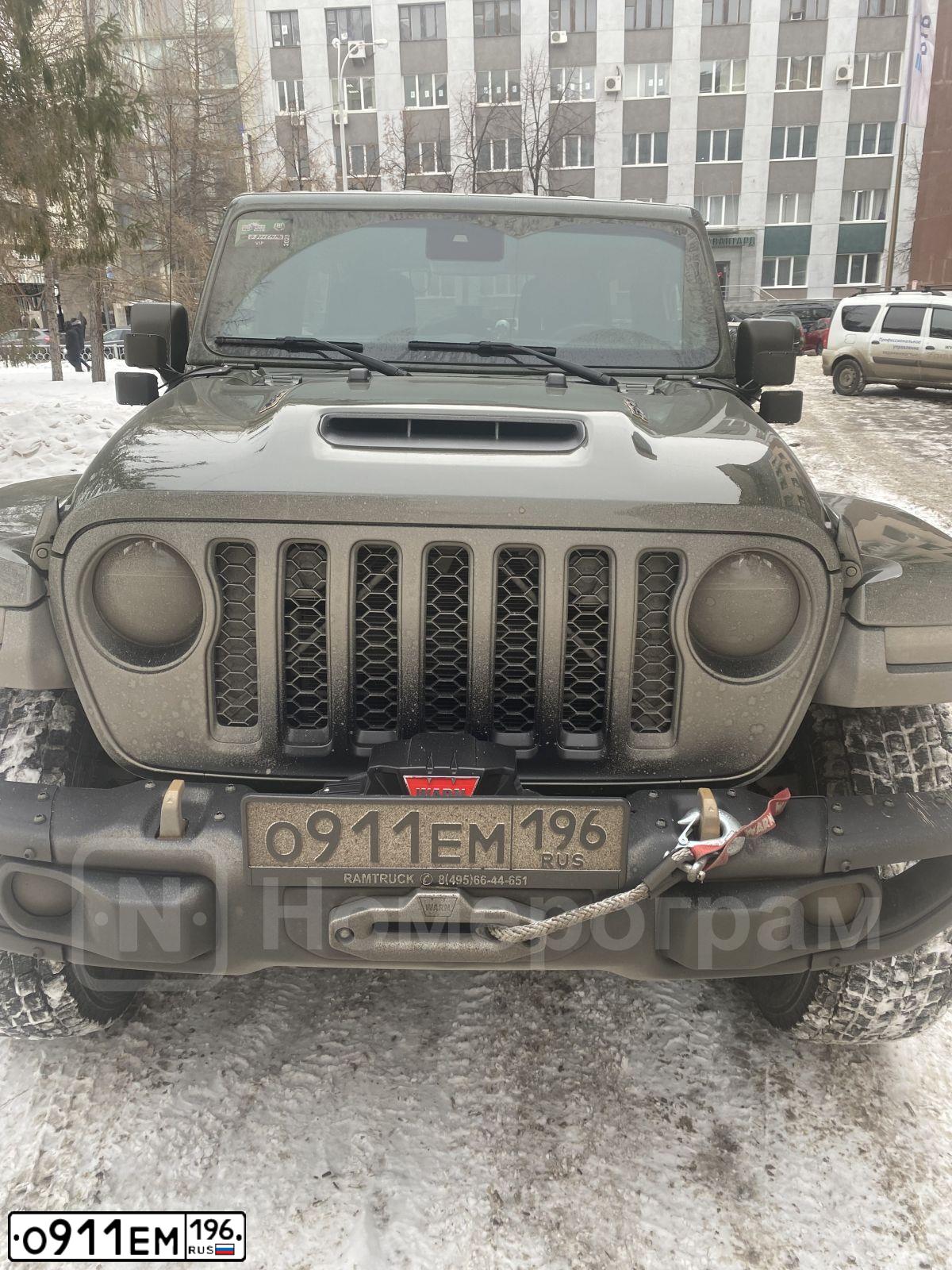 Фото автомобиля JEEP WRANGLER UNLIMITED RUBICON, 2021 — госномер О911ЕМ196. Цвет: ЗЕЛЕНЫЙ