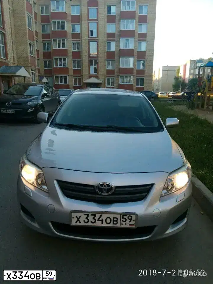 Фото автомобиля TOYOTA COROLLA, 2008 — госномер Р300УВ159. Цвет: Серебристый