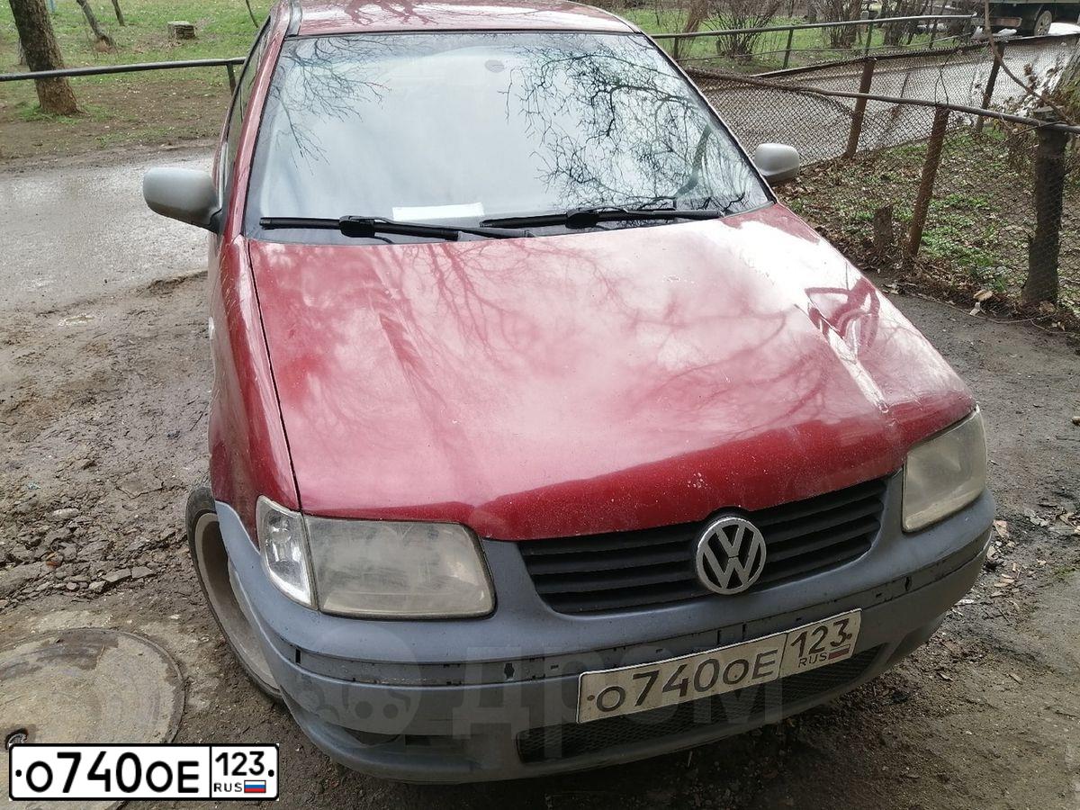 Фото автомобиля VOLKSWAGEN POLO, 2000 — госномер В054ЕС92. Цвет: Красный