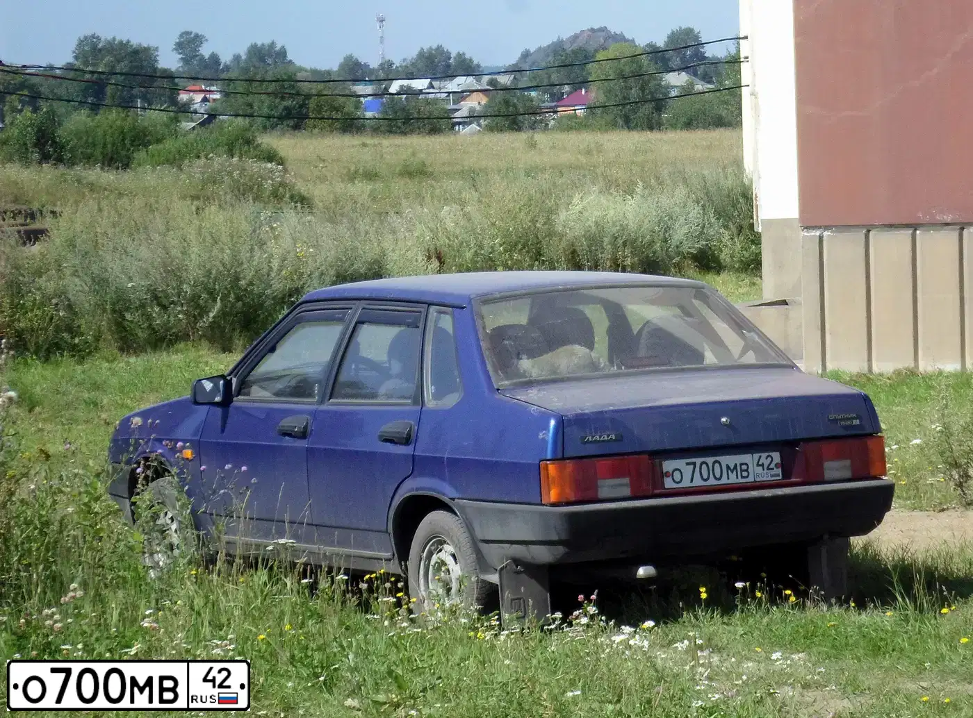 Фото автомобиля LADA 2109 SAMARA, 2002 — госномер К284НК35. Цвет: СЕРЕБРИСТЫЙ ЯРКО-СИНИЙ