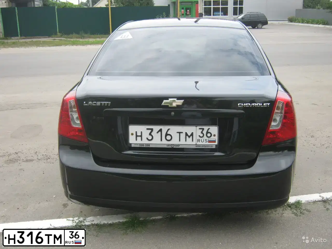 Фото автомобиля CHEVROLET LACETTI, 2011 — госномер Н316ТМ36. Цвет: ЧЕРНЫЙ