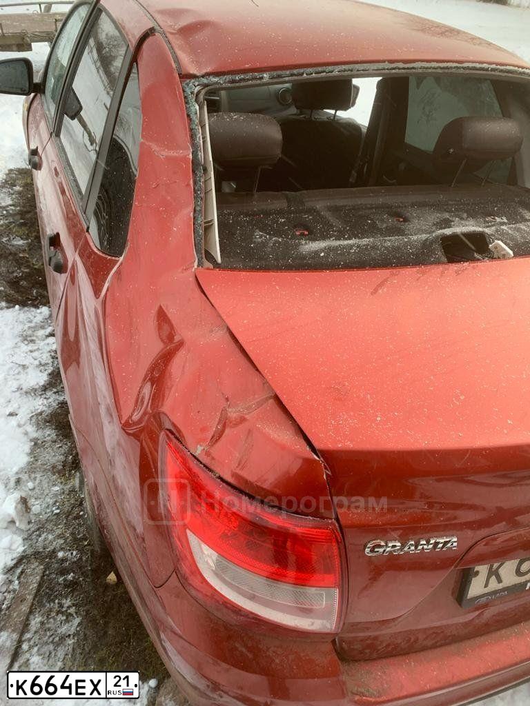 Фото автомобиля LADA GRANTA, 2019 — госномер М051МА21. Цвет: Красный