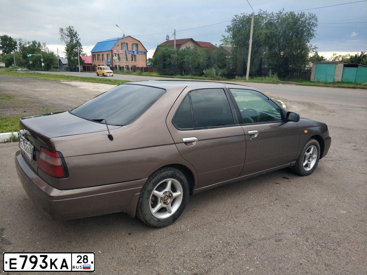 Фото автомобиля LADA 2112, 2001 — госномер К112СС161. Цвет: СЕРЕБРИСТЫЙ ТЕМНО-КРАСНЫЙ