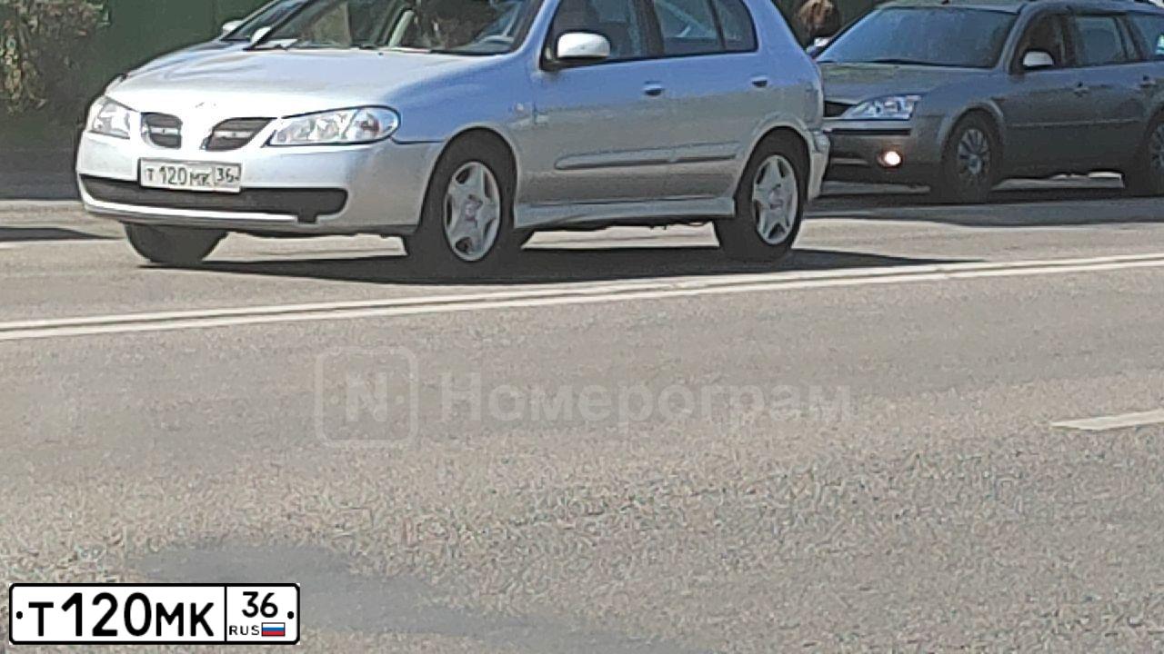 Фото автомобиля NISSAN ALMERA, 2002 — госномер Т120МК36. Цвет: Серебристый