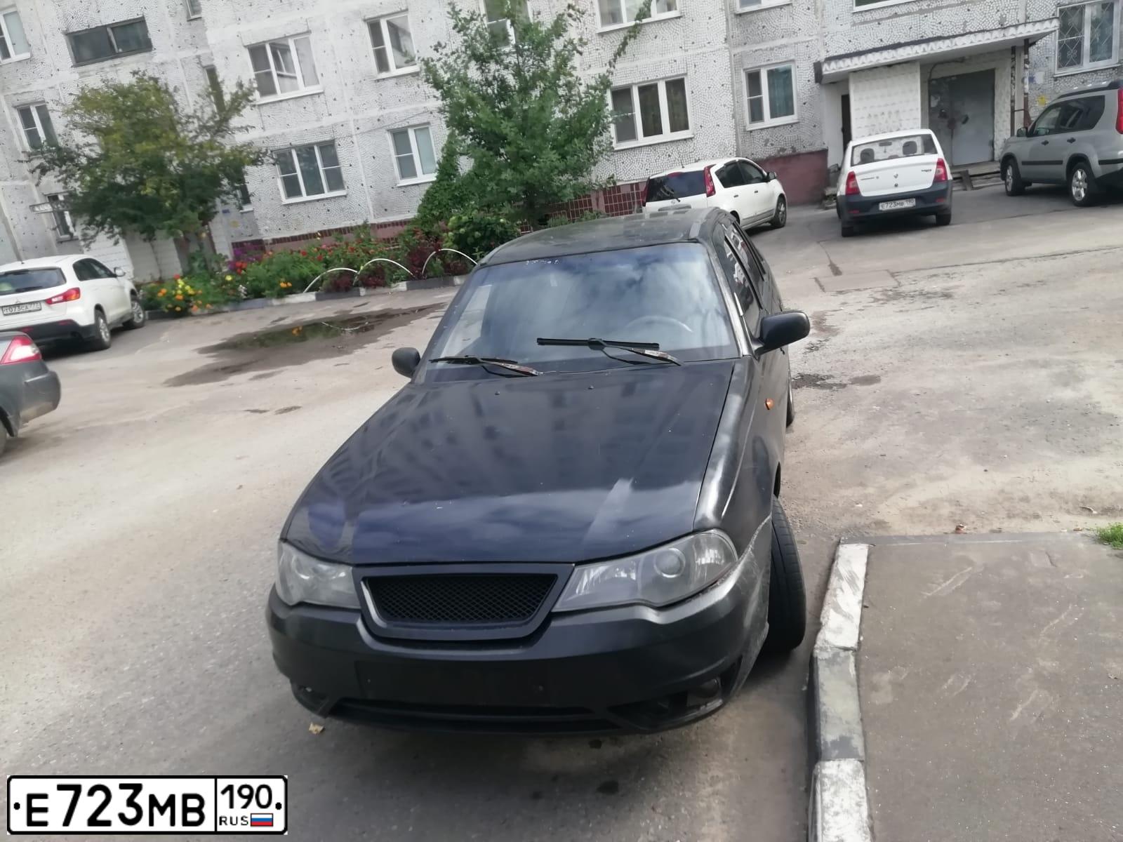 Фото автомобиля RENAULT LOGAN, 2010 — госномер Е723МВ190. Цвет: БЕЛЫЙ