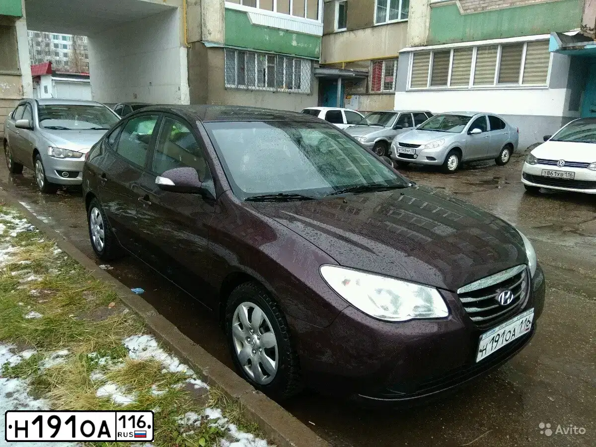 Фото автомобиля HYUNDAI ELANTRA, 2010 — госномер Е751ЕН11. Цвет: ВИШНЕВЫЙ