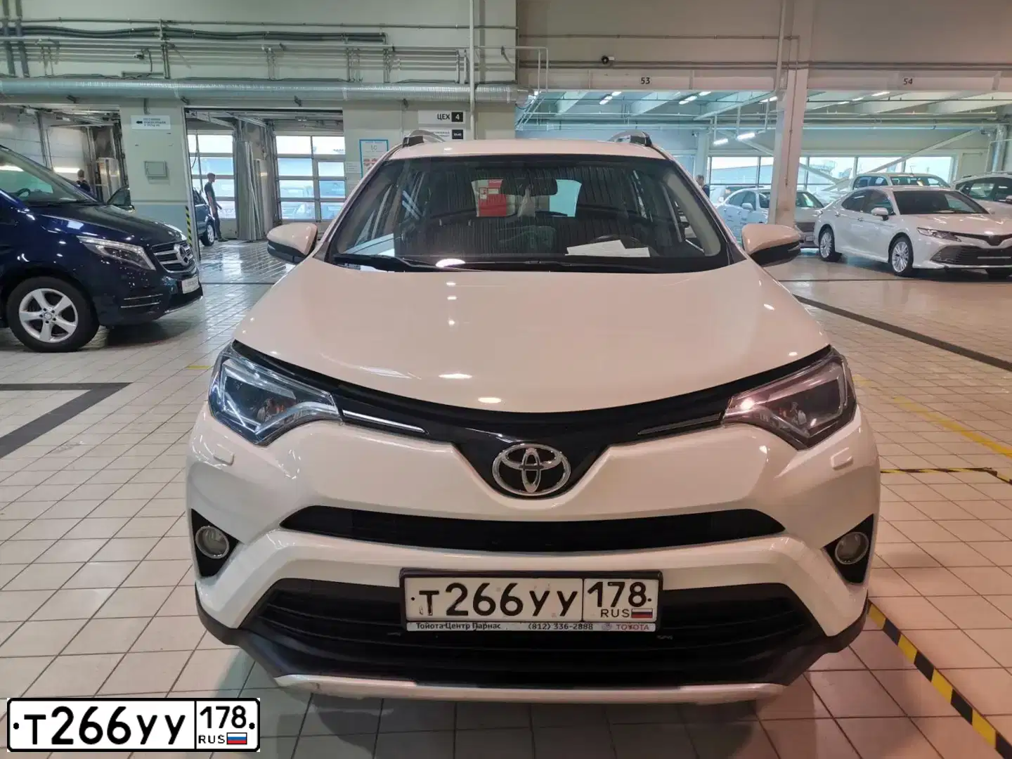 Фото автомобиля TOYOTA RAV4, 2015 — госномер Т127СЕ799. Цвет: БЕЛЫЙ