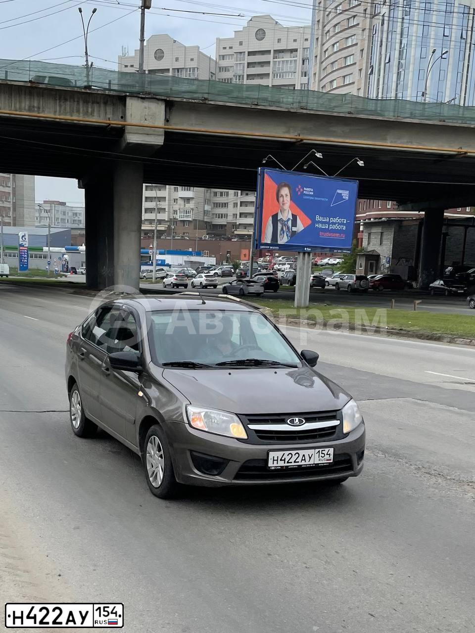 Фото автомобиля LADA 2191 GRANTA, 2018 — госномер Н422АУ154. Цвет: Золотисто-коричневый