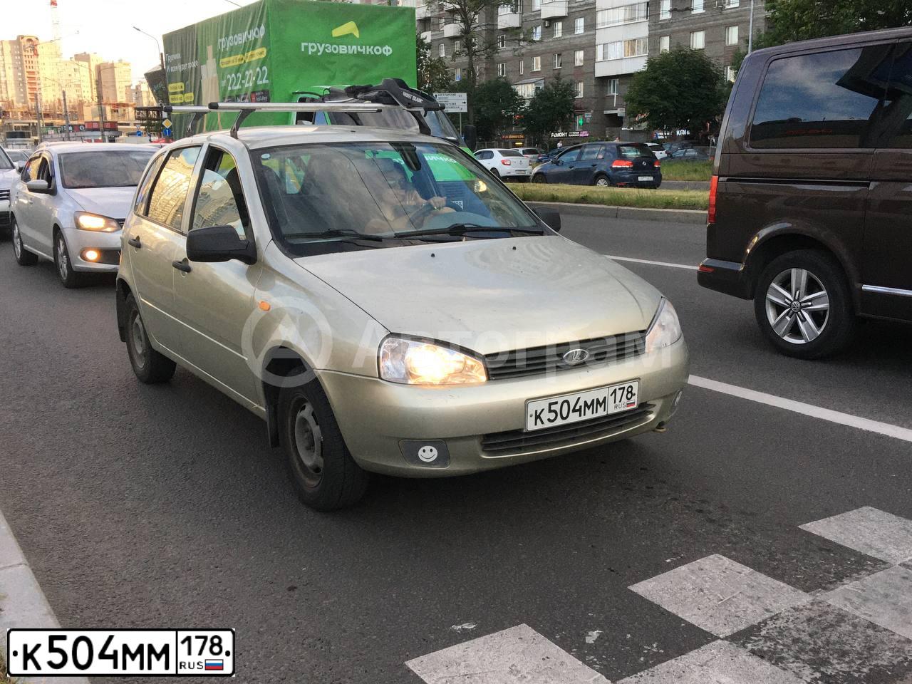 Фото автомобиля LADA 1119 KALINA, 2011 — госномер К504ММ178. Цвет: БЕЛО-ЖЕЛТЫЙ ПЕРЛАМУТРОВЫЙ