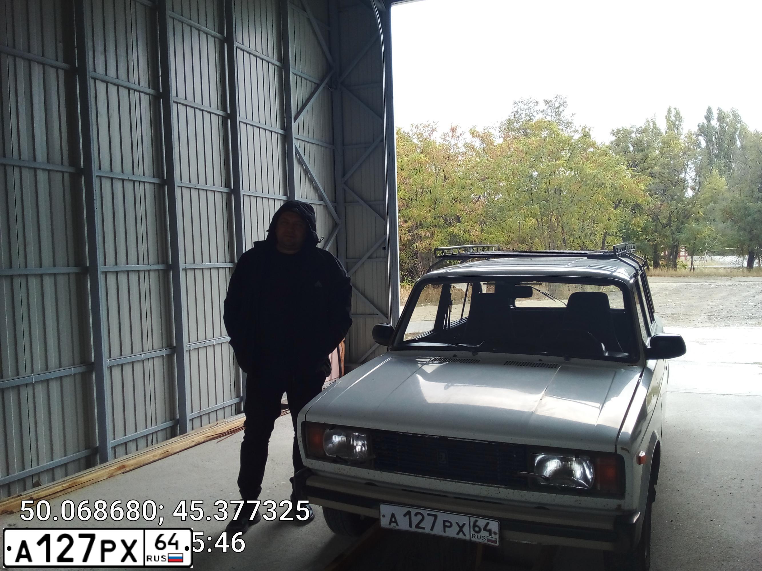 Фото автомобиля LADA 2104, 1996 — госномер Н033ВА134. Цвет: БЕЛЫЙ