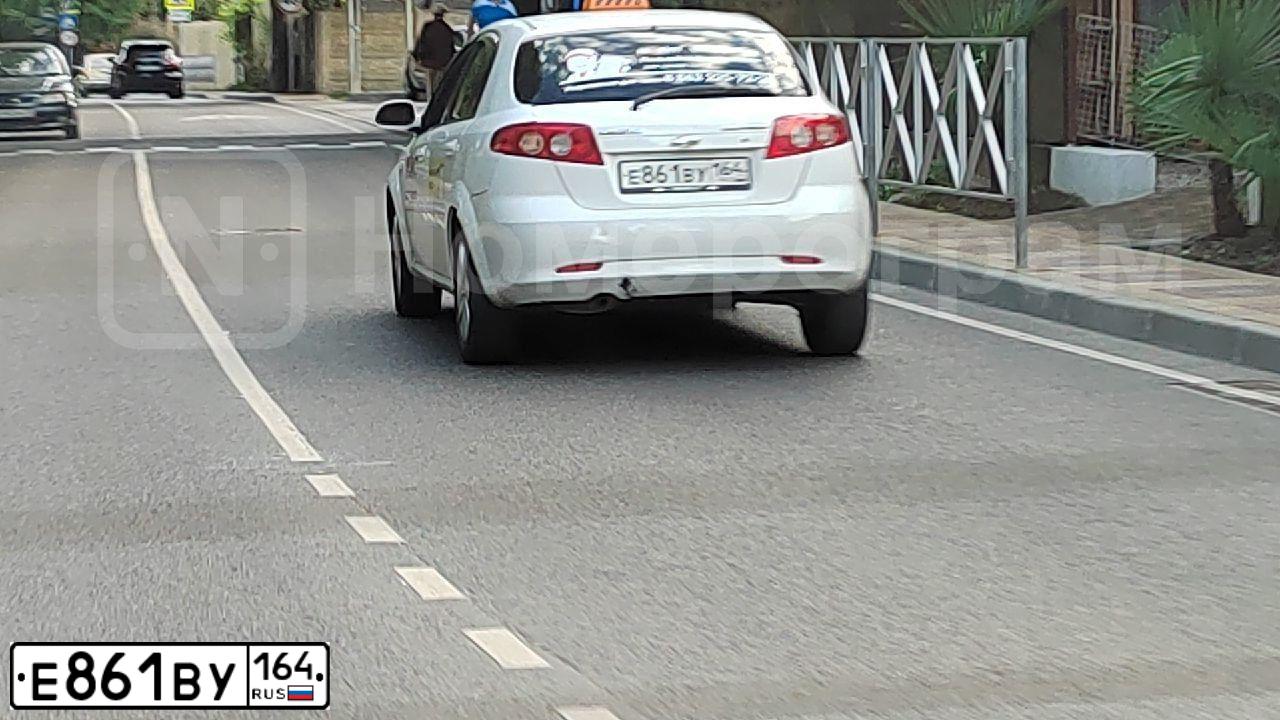 Фото автомобиля CHEVROLET LACETTI, 2006 — госномер М705ТУ13. Цвет: Белый