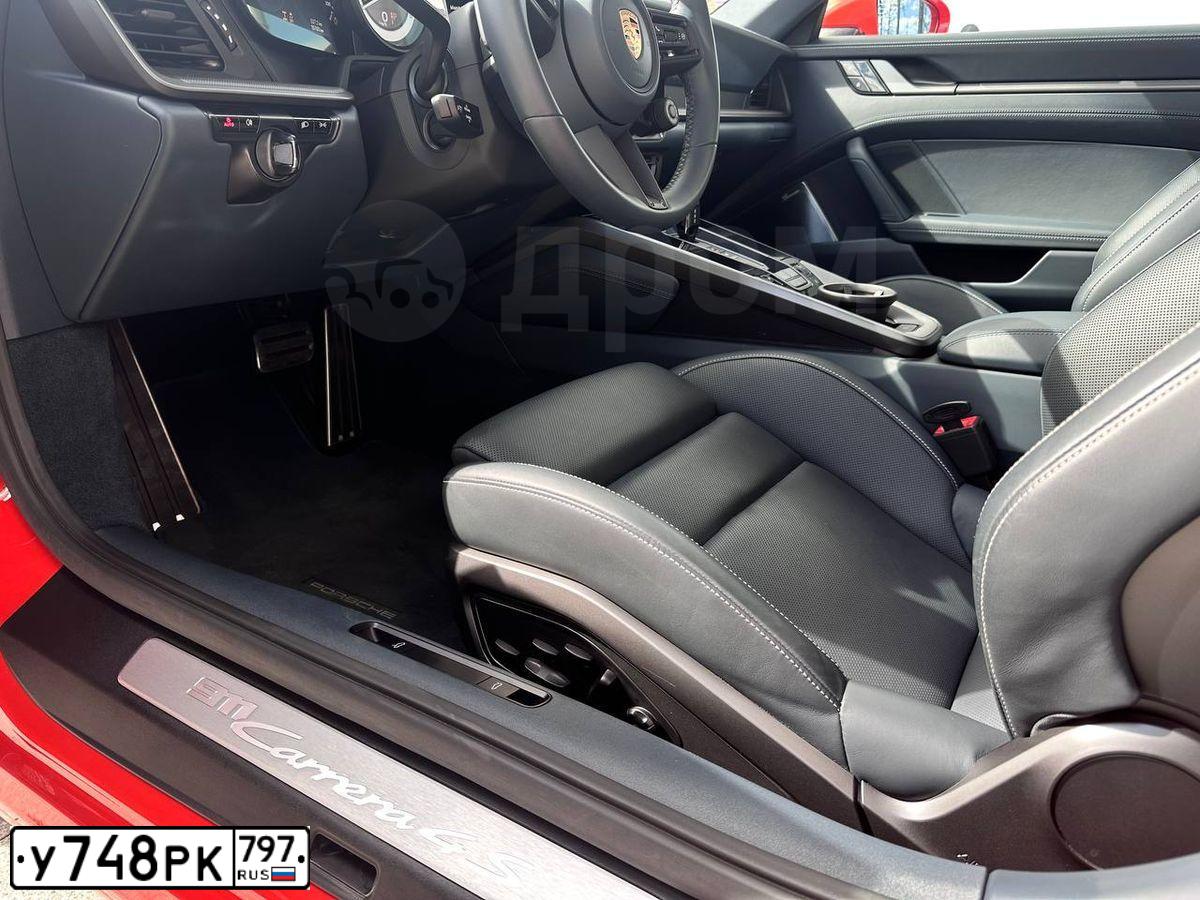 Фото автомобиля PORSCHE 911, 2019 — госномер В911АМ550. Цвет: Оранжевый