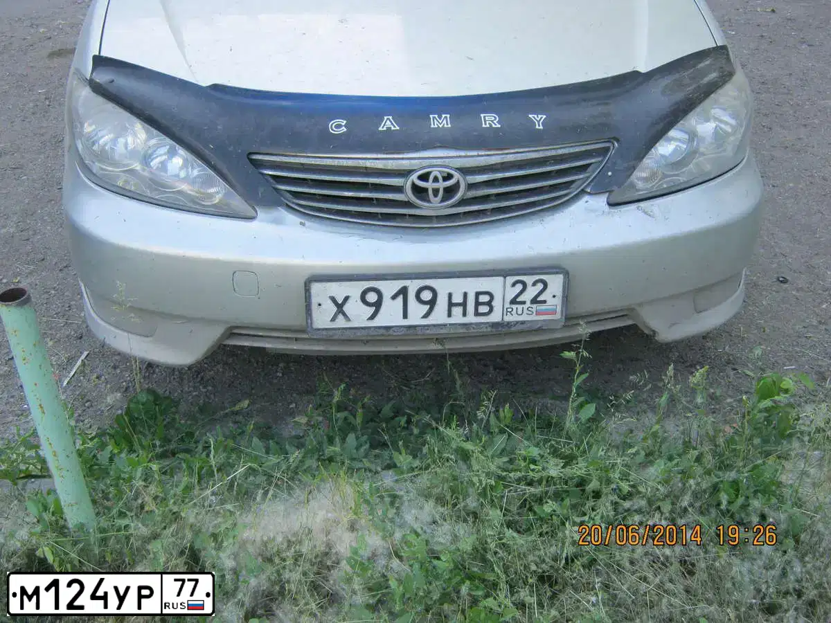 Фото автомобиля RENAULT DUSTER, 2013 — госномер М124УР77. Цвет: КОРИЧНЕВЫЙ