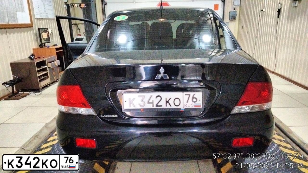 Фото автомобиля MITSUBISHI LANCER, 2006 — госномер К342КО76. Цвет: ЧЕРНЫЙ