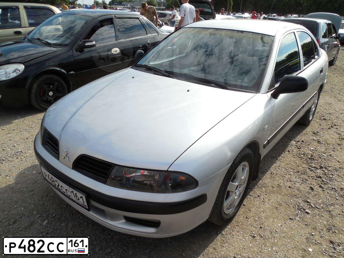 Фото автомобиля MITSUBISHI CARISMA, 2002 — госномер Р482СС161. Цвет: Серебристый