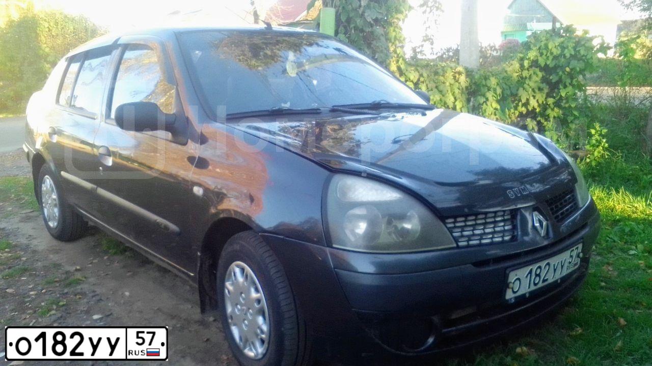 Фото автомобиля RENAULT SYMBOL, 2004 — госномер О182УУ57. Цвет: ТЕМНО-СЕРЫЙ