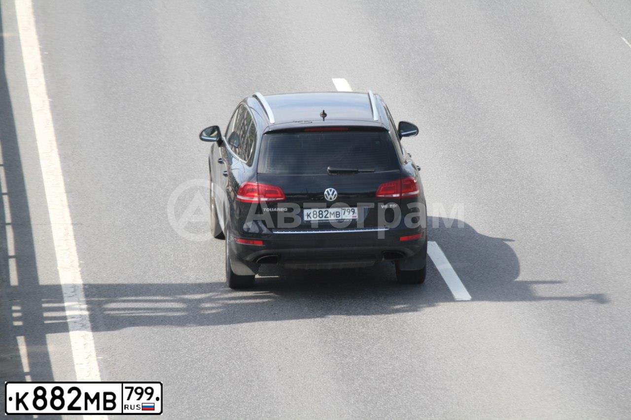 Фото автомобиля VOLKSWAGEN TOUAREG, 2011 — госномер Н700СУ197. Цвет: ЧЕРНЫЙ
