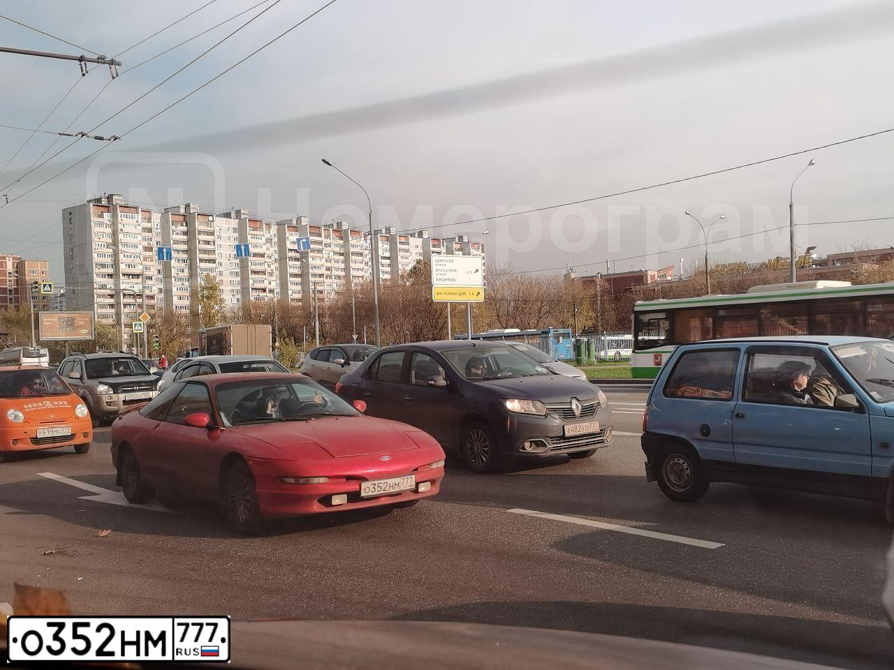 Фото автомобиля FORD PROBE, 1995 — госномер О352НМ777. Цвет: Красный