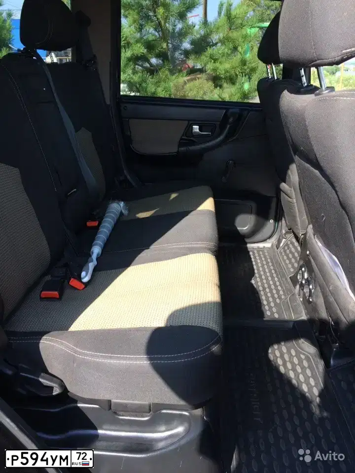 Фото автомобиля UAZ 3163 PATRIOT, 2012 — госномер Р594УМ72. Цвет: ЧЕРНЫЙ