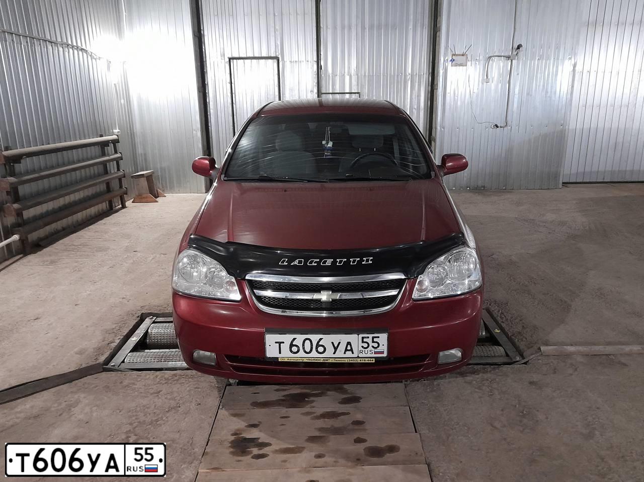 Фото автомобиля CHEVROLET LACETTI, 2007 — госномер Н363УС72. Цвет: ТЕМНО-КРАСНЫЙ