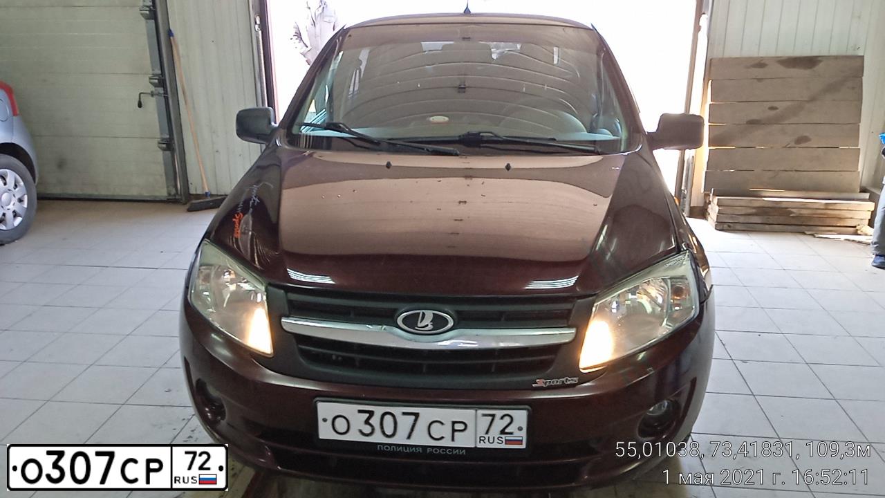 Фото автомобиля LADA 2190 GRANTA, 2012 — госномер О307СР72. Цвет: ТЕМНО-КРАСНЫЙ