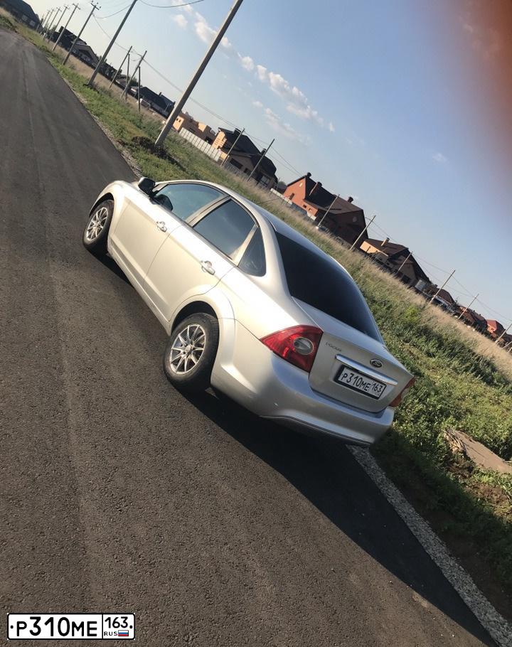Фото автомобиля FORD FOCUS, 2009 — госномер Н434УО123. Цвет: Серебристый