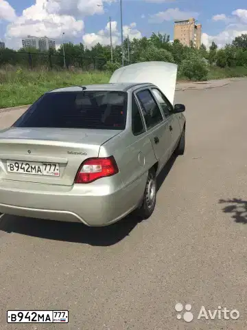 Фото автомобиля DAEWOO NEXIA, 2009 — госномер А070НХ34. Цвет: БЕЛЫЙ СЕРЫЙ