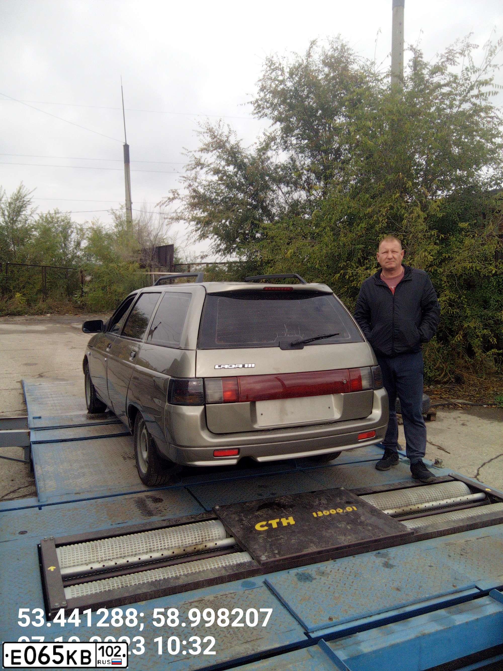 Фото автомобиля LADA 2111, 2002 — госномер Т969ВУ774. Цвет: СЕРЕБР-СЕРО-ЗЕЛЕНЫЙ