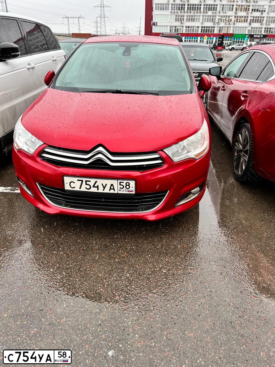 Фото автомобиля CITROEN C4, 2012 — госномер Н223ТЕ190. Цвет: Красный