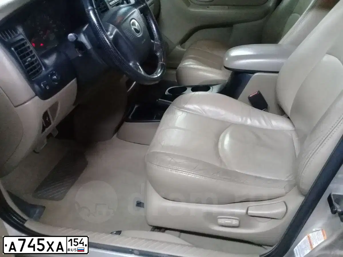 Фото автомобиля MAZDA TRIBUTE, 2002 — госномер А745ХА154. Цвет: ТЕМНО БЕЖЕВЫЙ
