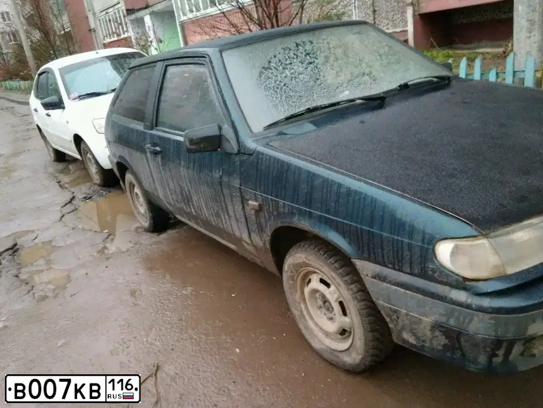 Фото автомобиля FORD FOCUS, 2010 — госномер У734СВ116. Цвет: БЕЛЫЙ