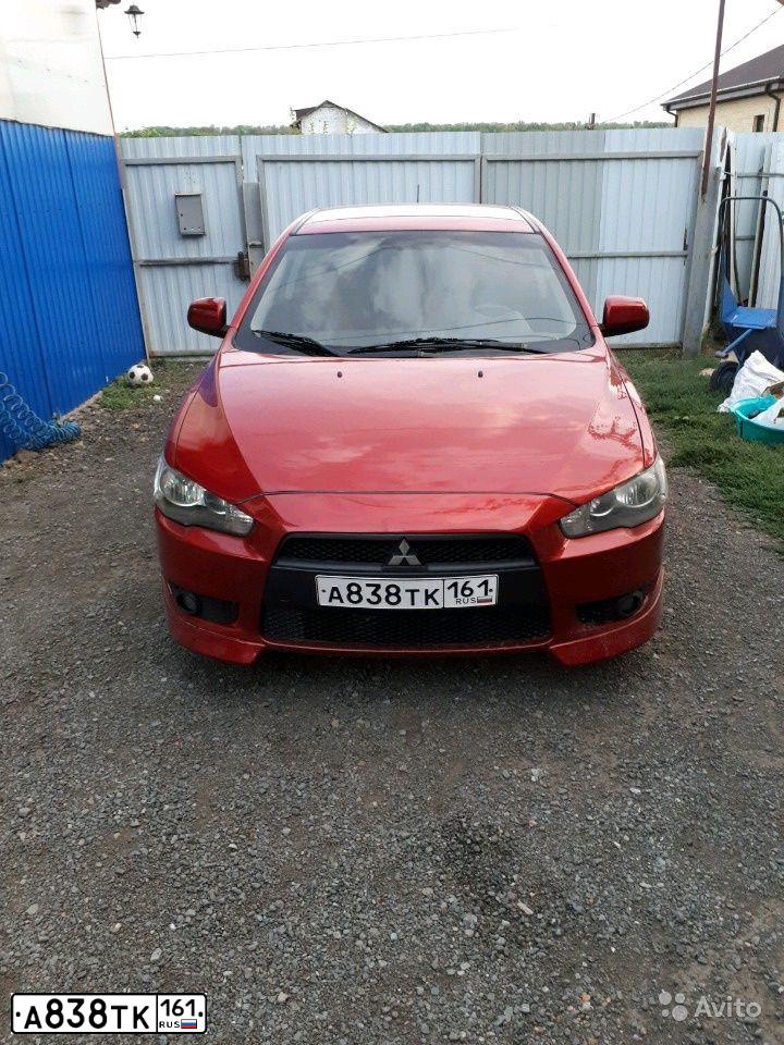 Фото автомобиля MITSUBISHI LANCER, 2007 — госномер С871МС33. Цвет: Красный
