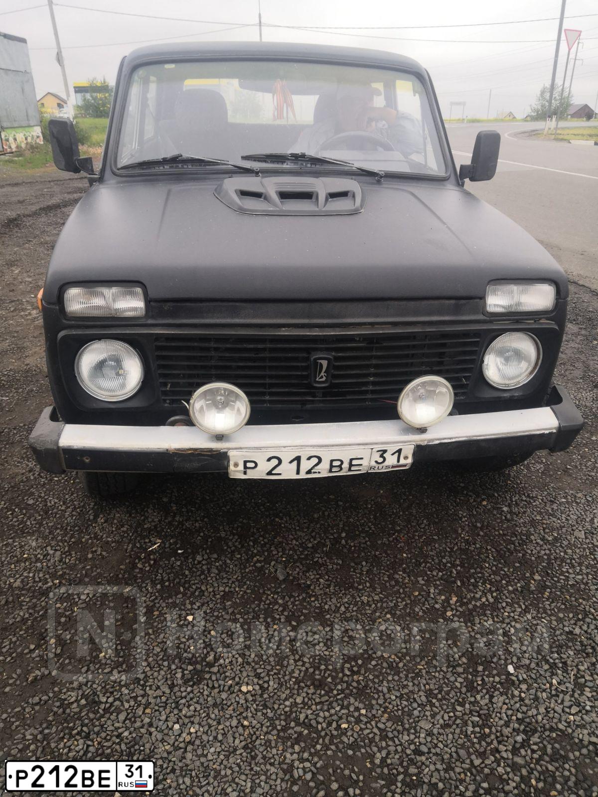Фото автомобиля LADA 2107 LADA, 2010 — госномер Н064АВ31. Цвет: Сине-Черный