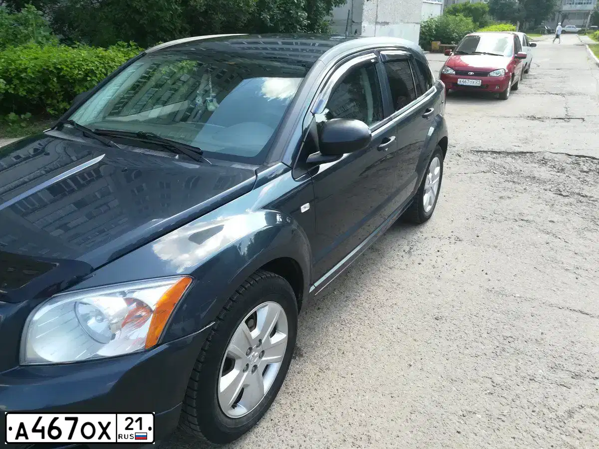 Фото автомобиля LADA 1117 KALINA, 2009 — госномер А467ОХ21. Цвет: КРАСНЫЙ