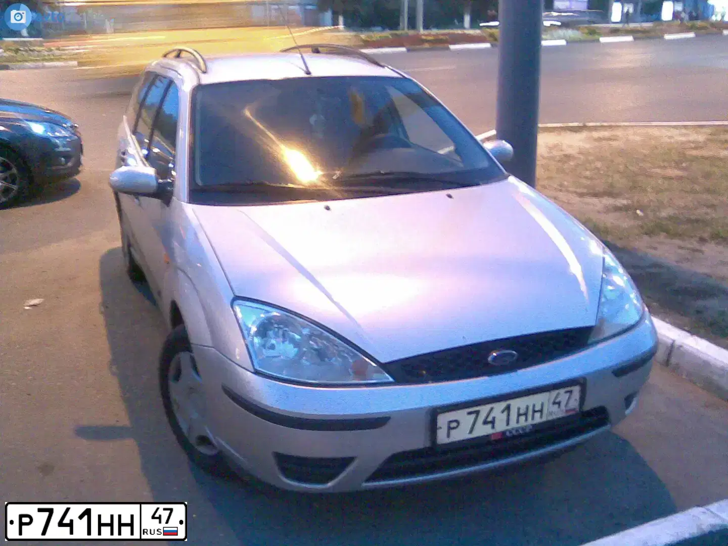 Фото автомобиля FORD FOCUS, 2003 — госномер Н736АС10. Цвет: СЕРЕБРИСТЫЙ