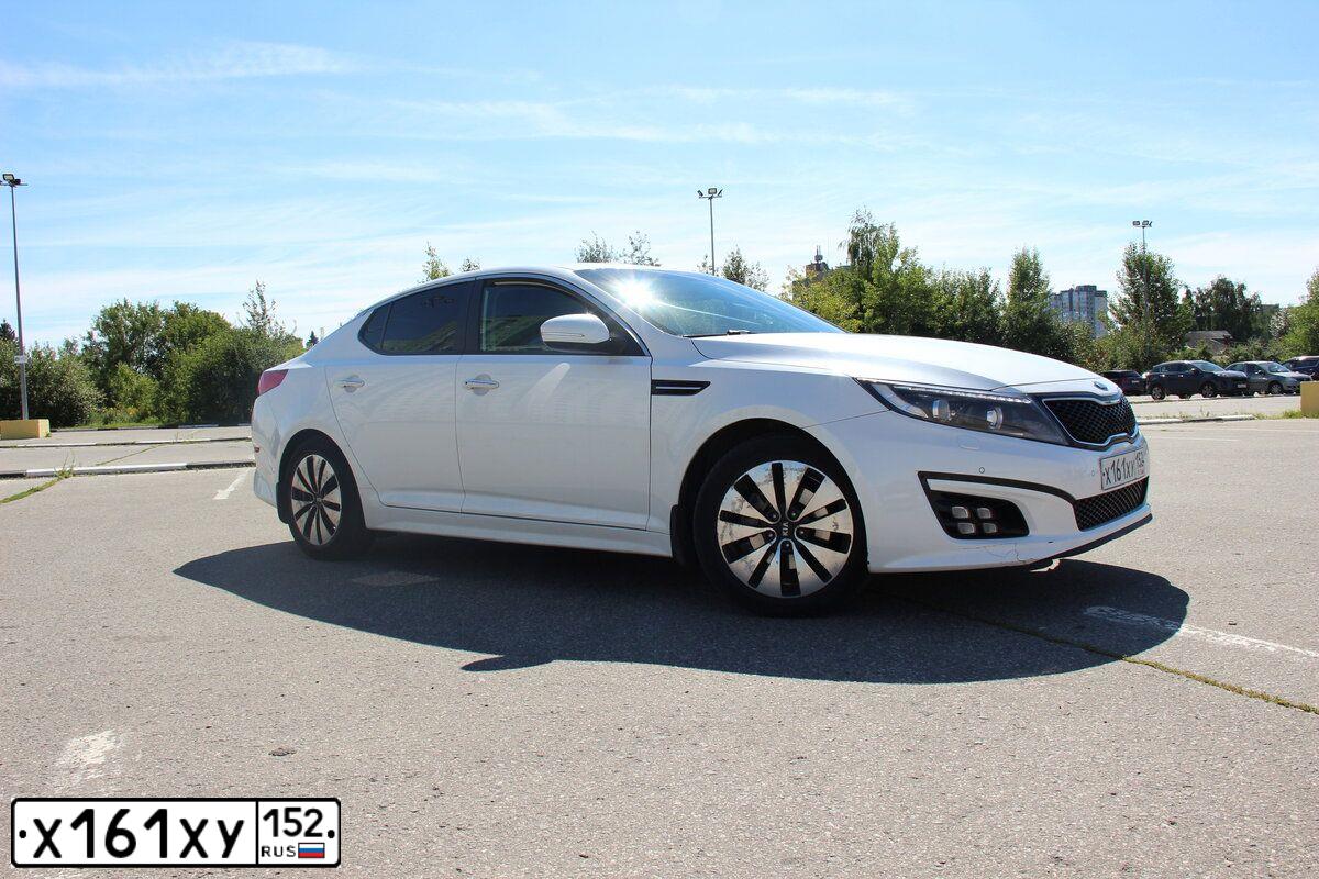 Фото автомобиля KIA MAGENTIS / OPTIMA, 2015 — госномер Е615СВ702. Цвет: Белый