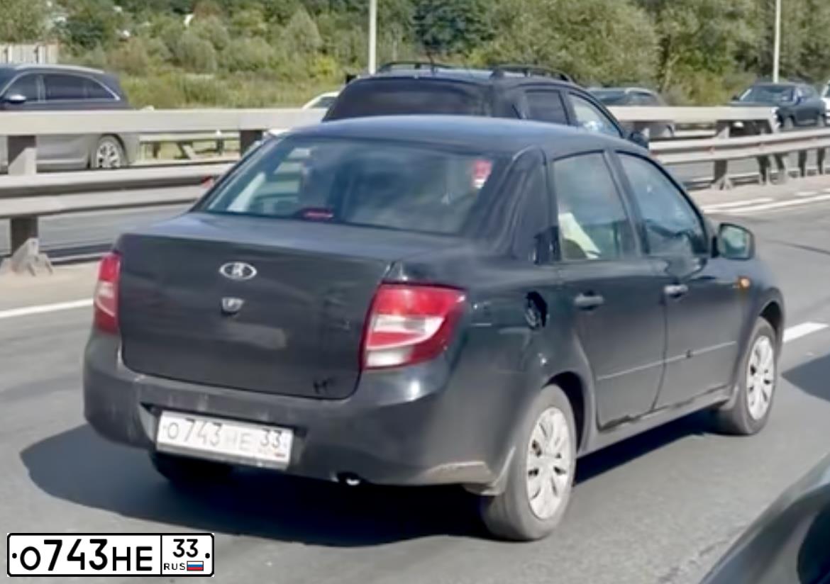 Фото автомобиля LADA 2190 GRANTA, 2014 — госномер О743НЕ33. Цвет: СИНЕ-ЧЕРНЫЙ